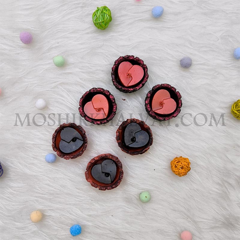 شمع وارمر قلب ترک خورده1 شمع وارمر قلب ترک خورده از نمای بالا