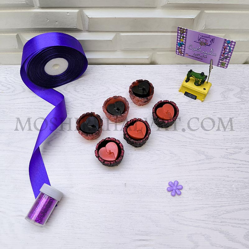 شمع وارمر قلب ترک خورده2 شمع وارمر قلب ترک خورده روی میز